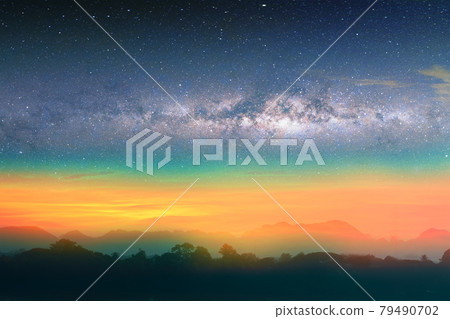 Milky way night landscape sunset rainbow light over silhouette mountain Milky way night landscape sunset rainbow light over silhouette mountain 79490702