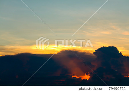 sunset sky back on dark silhouette cloud red lava hole of sun ray last light sunset sky back on dark silhouette cloud red lava hole of sun ray last light 79490711