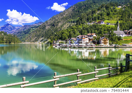 Amazing alpine scenery, Dolomites mountains. Beautiful lake lago di Alleghe, northern Italy (Belluno province) 79491444