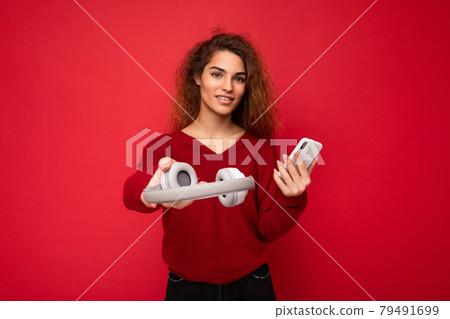 Photo of beautiful positive smiling young woman wearing stylish casual outfit isolated on colorful 79491699
