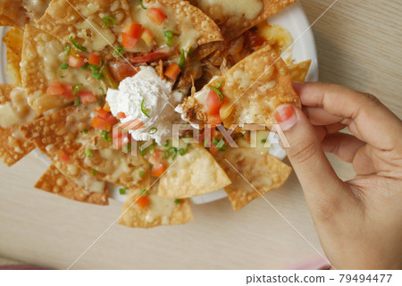 Corn chips nachos with fried minced meat Corn chips nachos with fried minced meat 79494477