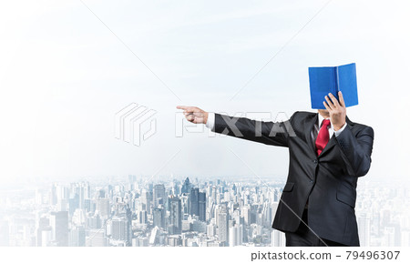 Businessman covered his face with organizer 79496307