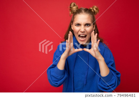 Photo of emotional dissatisfied young beautiful nice blonde woman with two horns with sincere 79496481