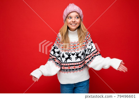 Beautiful positive happy young blonde woman isolated over colourful background wall wearing casual Beautiful positive happy young blonde woman isolated over colourful background wall wearing casual 79496601