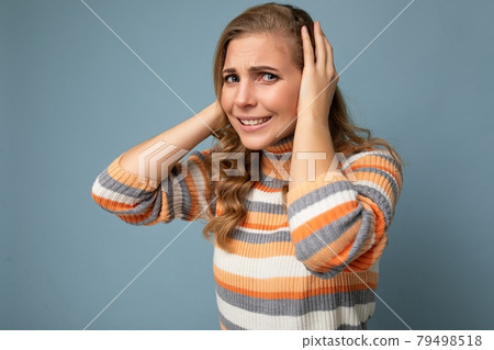 Photo of young emotional angry pretty nice blonde curly woman with sincere emotions wearing casual Photo of young emotional angry pretty nice blonde curly woman with sincere emotions wearing casual 79498518