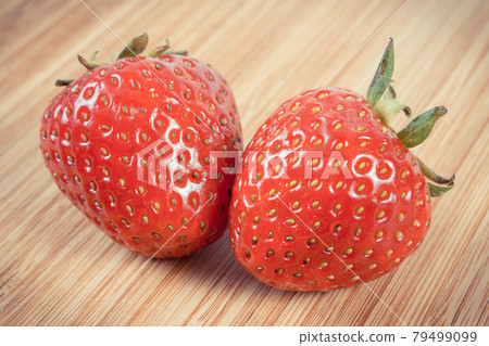 Fresh delicious strawberry on board. Healthy dessert and nutrition 79499099