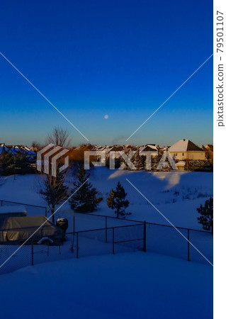 Canada's cold early morning moonset 79501107