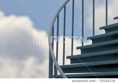 Blue sky and spiral staircase Blue sky and spiral staircase 79508154