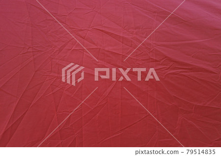 Wrinkled red canvas. Red textured background. Red canvas abstract background 79514835