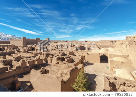 Citadel Rayen, the ancient city built from the sand nearby Kerman. Today abandoned, similar place like Bam, smaller but today looks better then just ruins. Citadel Rayen, the ancient city built from the sand nearby Kerman. Today abandoned, similar place like Bam, smaller but today looks better then just ruins. 79520852