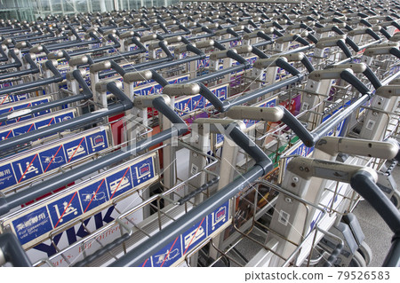 25 March 2006 Trolly cart in row in Airport baggage carry at hk 79526583