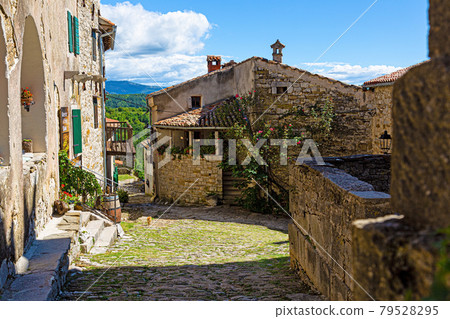 Street scene of the historic town Hum in Croatia during daytime Street scene of the historic town Hum in Croatia during daytime 79528295
