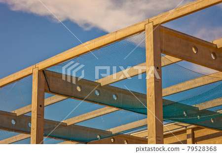 Construction site with precast concrete columns, beams and walls Construction site with precast concrete columns, beams and walls 79528368