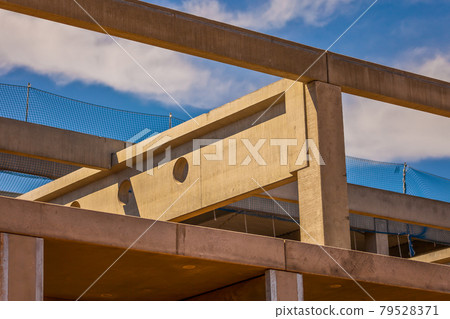 Construction site with precast concrete columns, beams and walls Construction site with precast concrete columns, beams and walls 79528371