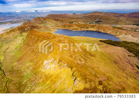 Aerial view of Lough Na Lughraman seen from Slieve Tooey in County Donegal - Ireland 79533383