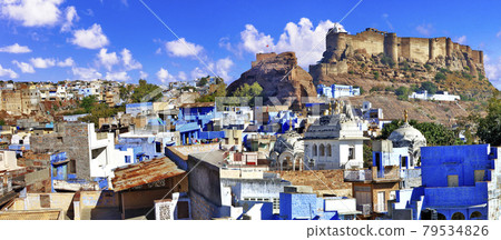 Travel and landmarks of India. beautiful blue city of Rajasthan - Jodhpur. view with Mehrangarh fort Travel and landmarks of India. beautiful blue city of Rajasthan - Jodhpur. view with Mehrangarh fort 79534826