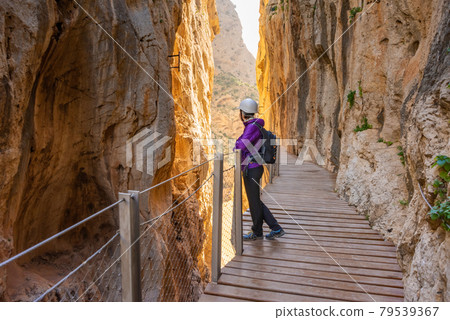 tourist woman in El Caminito del Rey tourist attraction Malaga, Spain 79539367