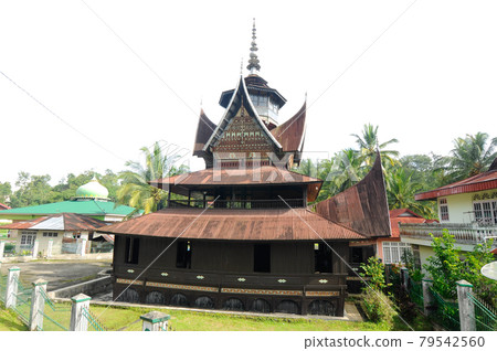 SUMATERA, INDONESIA -JUNE 10, 2014: Facade of Surau Nagari Lubuk Bauk at Tanah Datar, Sumatera Barat, Indonesia. It was a place for muslim to perform prayer and religious activity since 1901. 79542560