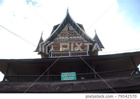 SUMATERA, INDONESIA -JUNE 10, 2014: Facade of Surau Nagari Lubuk Bauk at Tanah Datar, Sumatera Barat, Indonesia. It was a place for muslim to perform prayer and religious activity since 1901. 79542570