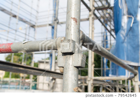 Construction site scaffolding 79542645