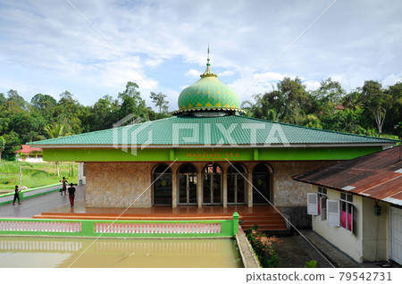 SUMATERA, INDONESIA -JUNE 10, 2014: The New Mosque of Surau Nagari Lubuk Bauk at Tanah Datar, Sumatera Barat, Indonesia. SUMATERA, INDONESIA -JUNE 10, 2014: The New Mosque of Surau Nagari Lubuk Bauk at Tanah Datar, Sumatera Barat, Indonesia. 79542731