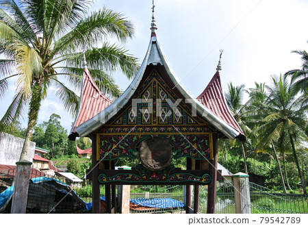 SUMATERA, INDONESIA -JUNE 10, 2014: Traditional beduk at Surau Nagari Lubuk Bauk at Tanah Datar, Sumatera Barat, Indonesia. Traditional drum will be in the hammer when the time for prayer. 79542789