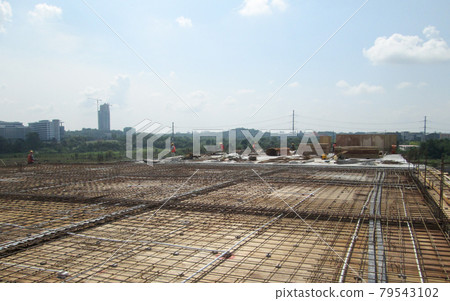 SELANGOR, MALAYSIA -MAY 13, 2016: Steel reinforcement bar at the construction site to form steel reinforced concrete slab. It use to strengthen the concrete. It is shaped follow the engineer design. 79543102