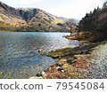 A body of water with a mountain in the background painting 79545084