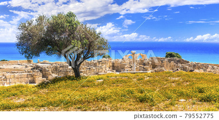 Ancient temples and turquoise sea -main touristic attractions of Cyprus island. columns of Kourion temple Ancient temples and turquoise sea -main touristic attractions of Cyprus island. columns of Kourion temple 79552775