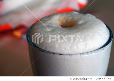 Latte - coffee with frothy milk. Latte - coffee with frothy milk. 79553066