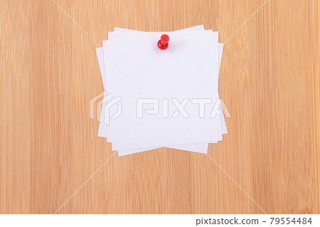 White Sticky Notes Pinned to the Wooden Message Board 79554484