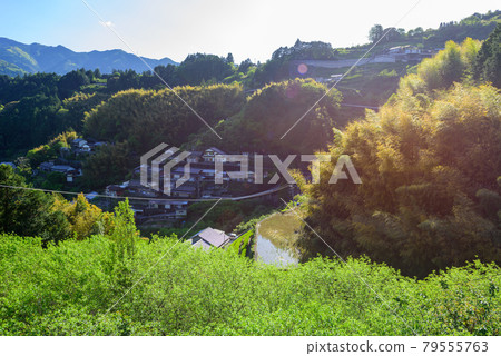 Countryside landscapes, mountain slope settlements and sunsets 79555763