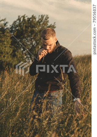 Man cowboy western car red light sunset summer 79556837