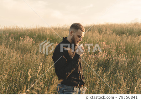 Man cowboy western car red light sunset summer 79556841