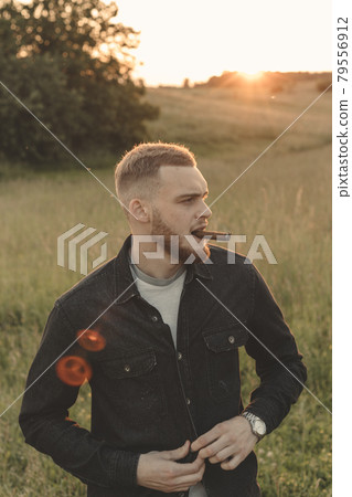 Man cowboy western car red light sunset summer 79556912