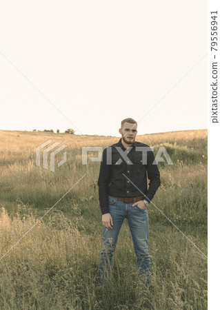 Man cowboy western car red light sunset summer 79556941