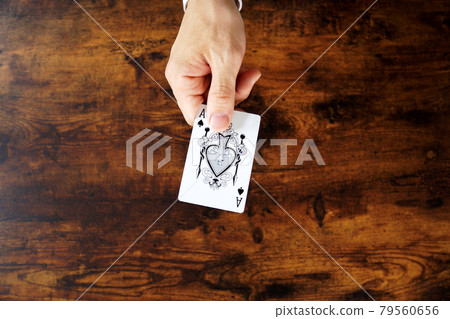 Hand to present playing cards 79560656