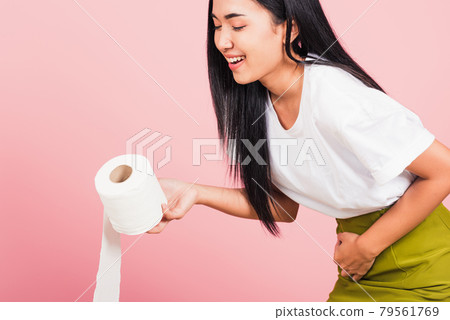 woman diarrhea constipation holding stomachache and tissue toilet paper 79561769