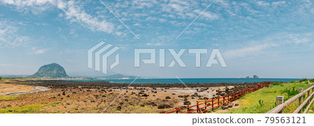Panoramic view of Sanbangsan Mountain and beach, Jeju Olle Trail in Jeju Island, Korea Panoramic view of Sanbangsan Mountain and beach, Jeju Olle Trail in Jeju Island, Korea 79563121