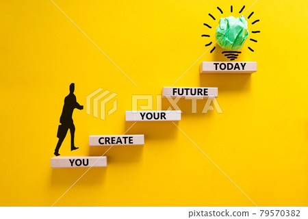 You create your future today symbol. Concept words 'You create your future today' on wooden blocks on a beautiful yellow background. Businessman icon. Business, motivational and create future concept. 79570382