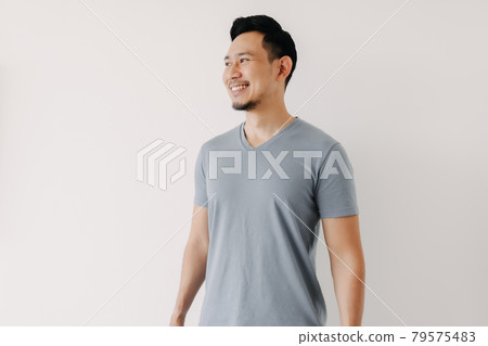Portrait of happy man in blue t-shirt isolated on white background. Portrait of happy man in blue t-shirt isolated on white background. 79575483