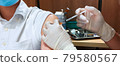 Asian man receive Coronavirus vaccine injection jab by nurse at hospital healthcare clinic service 79580567