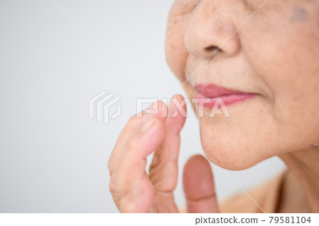 Senior female Nasolabial fold aging care 79581104