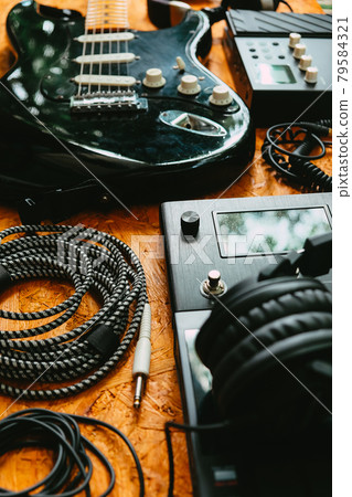 Guitar and music studio equipment 79584321