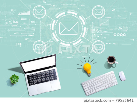 Email concept with computers with a light bulb Email concept with computers with a light bulb 79585641