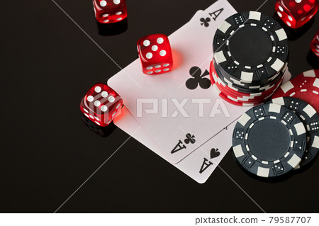 Casino chips, playing cards and dices on dark reflective background 79587707