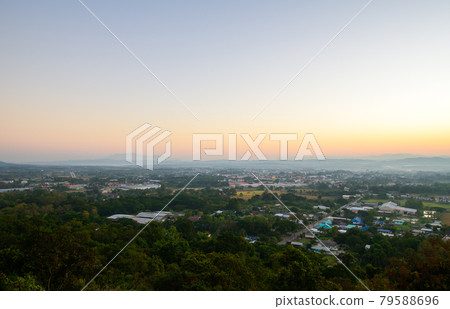 Aerial view of Nan city on morning with sunlight. Northern of Thailand Aerial view of Nan city on morning with sunlight. Northern of Thailand 79588696