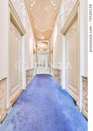 A long empty corridor designed in minimalistic style A long empty corridor designed in minimalistic style 79589139