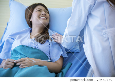 Woman doctor and patient consultation with professional specialist diagnostics at hospital medicare treatment clinic. Doctor writing prescription for medical health care therapy. Woman doctor and patient consultation with professional specialist diagnostics at hospital medicare treatment clinic. Doctor writing prescription for medical health care therapy. 79589779