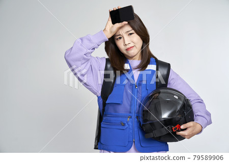 delivery, deliveryman, shipping, courier, deliveryman, helmet, young woman, nukki, gray background delivery, deliveryman, shipping, courier, deliveryman, helmet, young woman, nukki, gray background 79589906